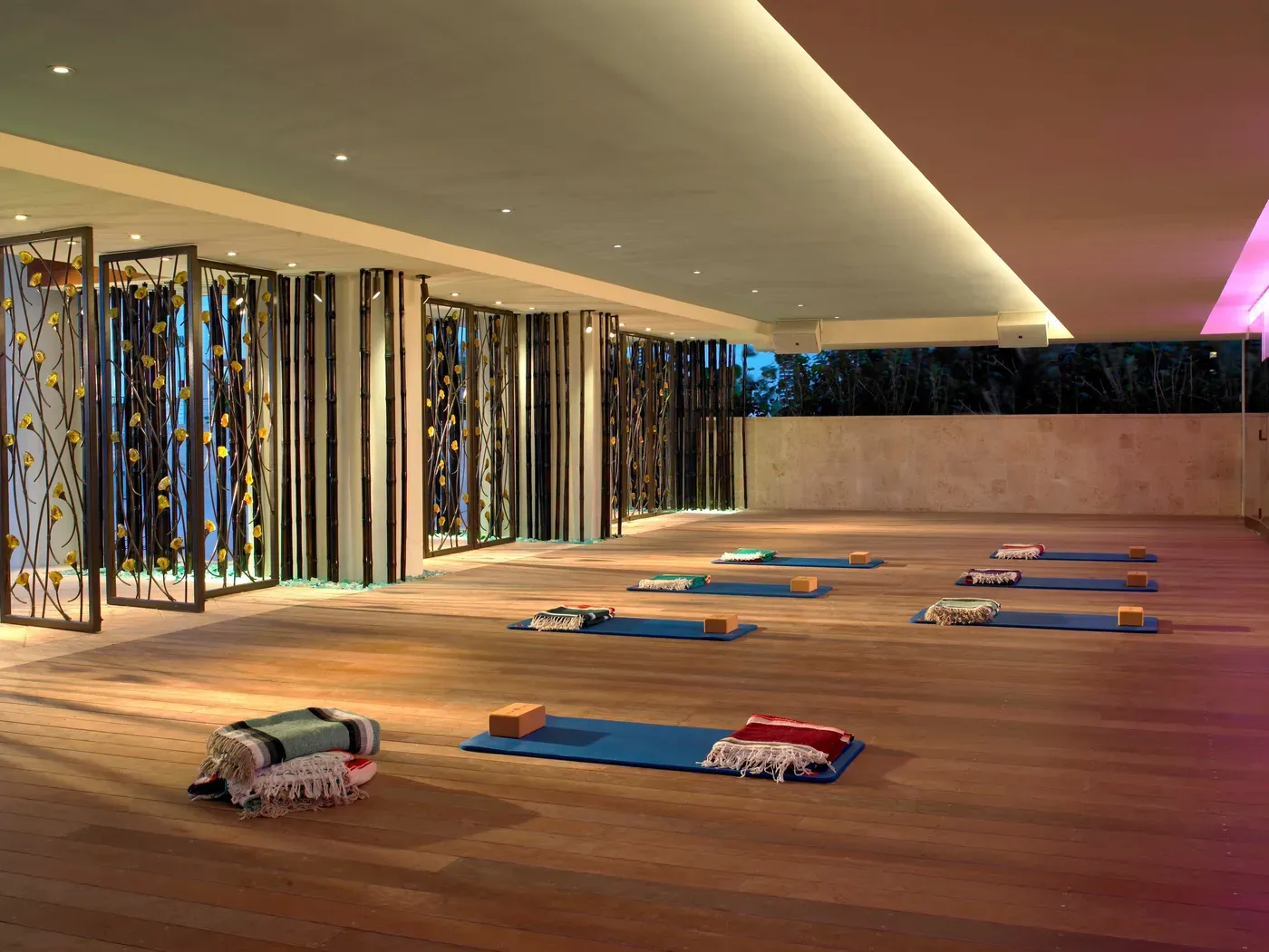 Guests enjoying a wellness yoga session at the resort