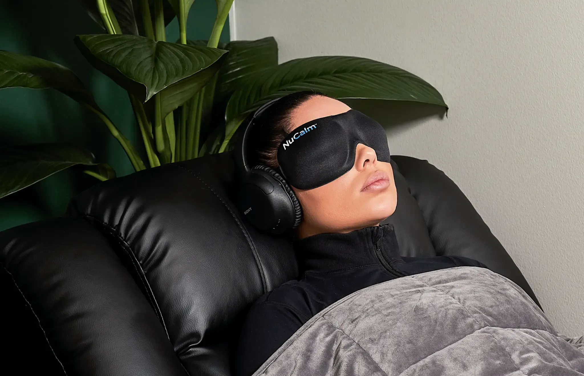 Person peacefully using NuCalm for relaxation