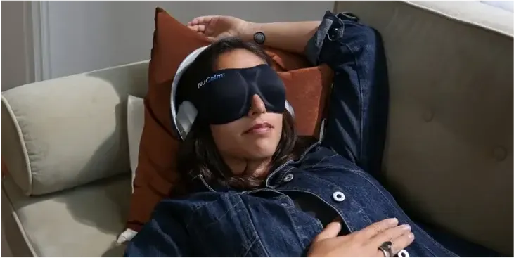 Lady wearing headphones and using NuCalm