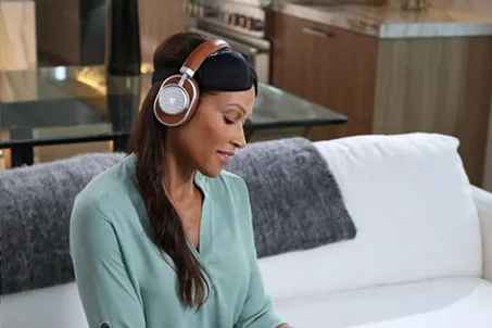 Lady wearing headphones and using NuCalm