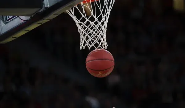Basketball player under competitive pressure