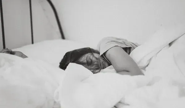 Athlete waking up rested after quality sleep